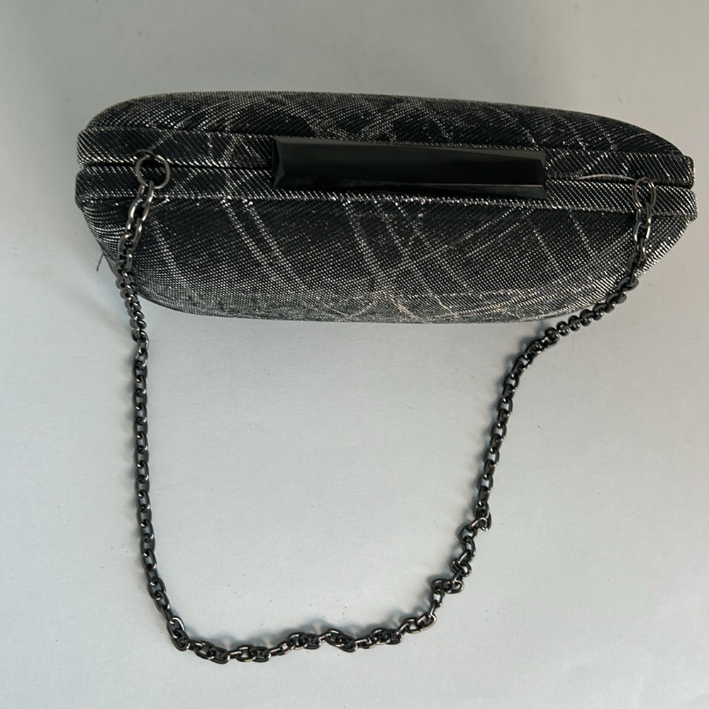Sondra Roberts Hard Case Convertible Clutch
Black/silver Metallic - Picture 2 of 6